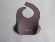 Load image into Gallery viewer, Silicone Baby Bib with pouch, BPA free, non-toxic, earthy natural colours and tones, cream, purple mauve, sage green
