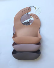 Load image into Gallery viewer, Silicone Baby Bib with pouch, BPA free, non-toxic, earthy natural colours and tones, cream, nude colour, light mauve purple Lauri Australia
