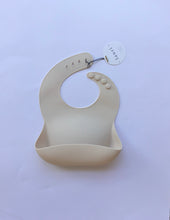 Load image into Gallery viewer, Silicone Baby Bib with pouch, BPA free, non-toxic, earthy natural colours and tones, cream, nude colour, Milk, light beige cream colour Lauri Australia
