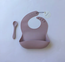 Load image into Gallery viewer, Silicone Baby Bib with pouch, BPA free, non-toxic, earthy natural colours and tones, cream, nude colour, light mauve purple with silicone spoonLauri Australia
